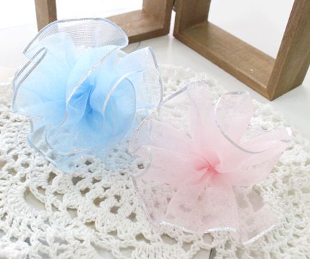 Прозора стрічка з бантом з сріблястими краями